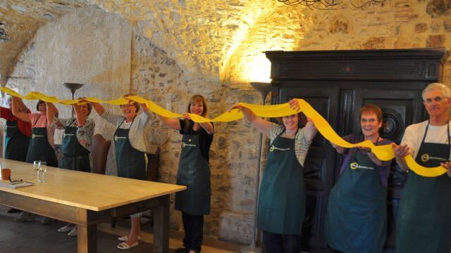 Getting everyone involved during our Umbrian cooking classes makes the fresh pasta that much better